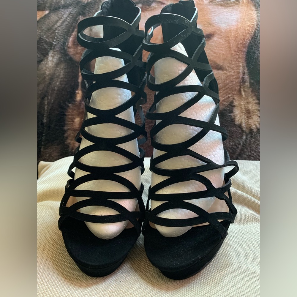 Caged Black Heels gently worn once. 5” heel with 1.5” platform. MAY SALE $25.00